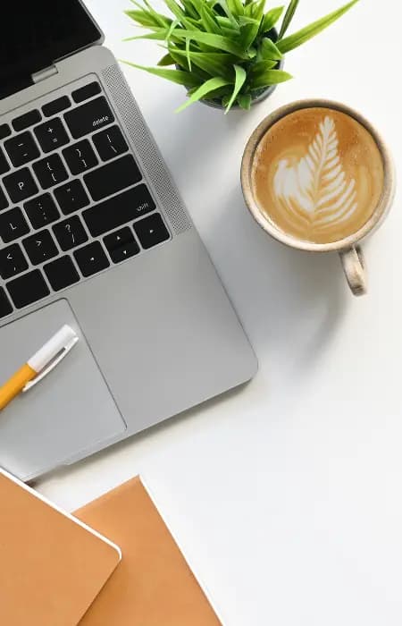 coffee cup and laptop